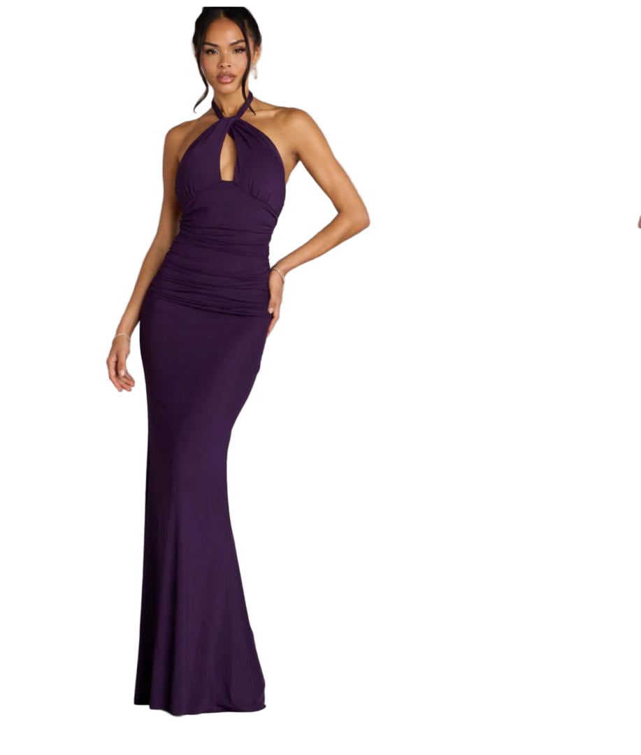Purple evening gown on a model against a gray background