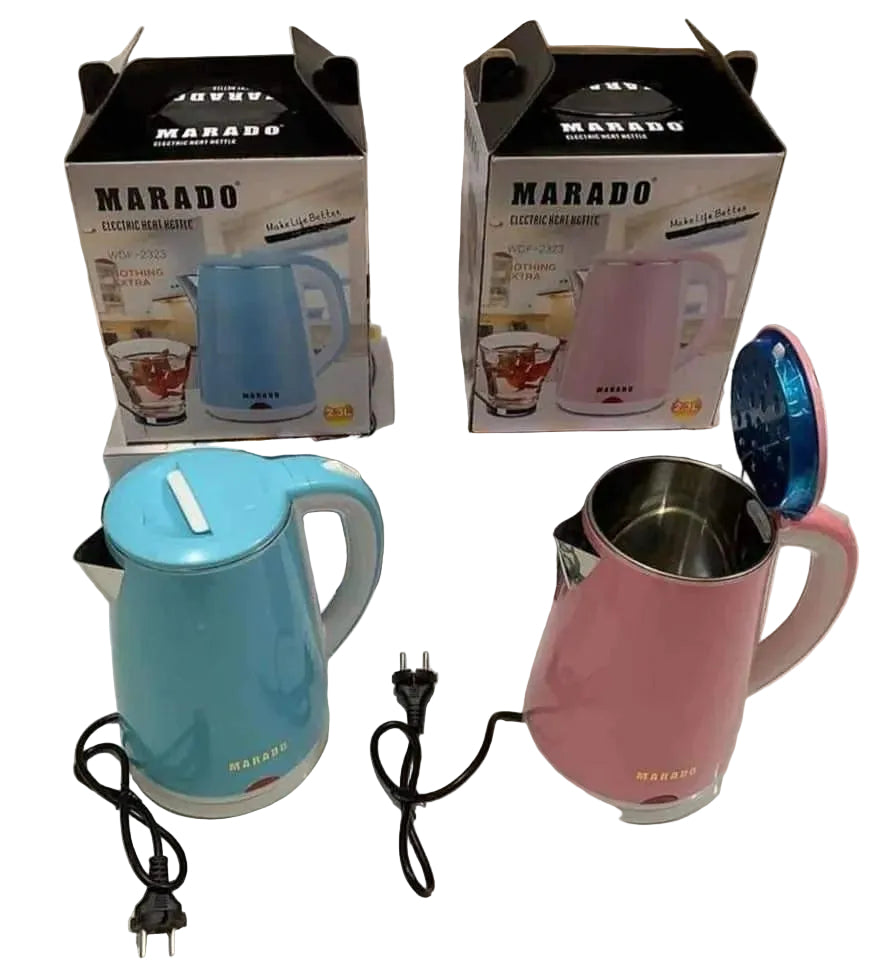 Two electric kettles, one blue and one pink, with their packaging on a white surface.