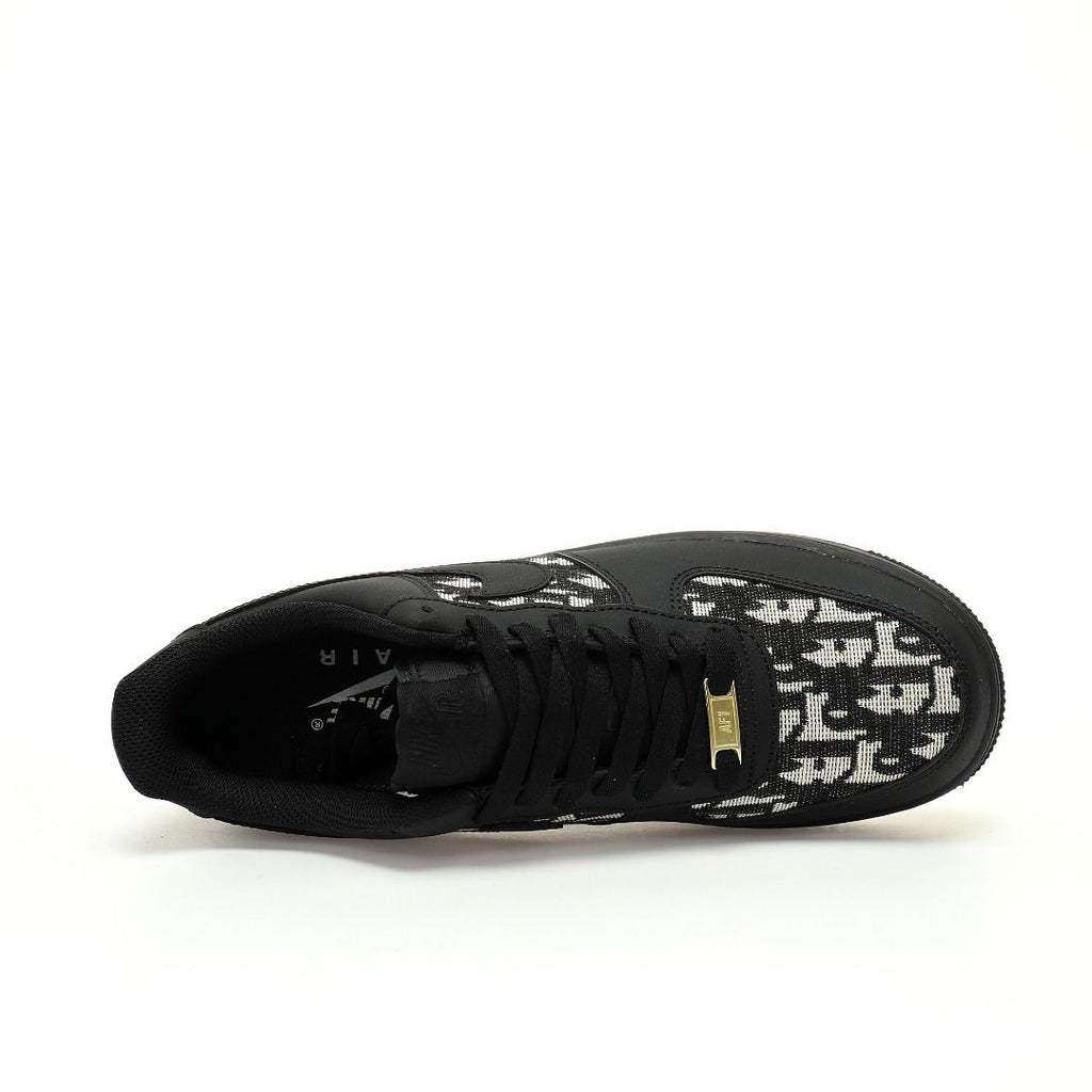 Black sneaker with white pattern on a white background