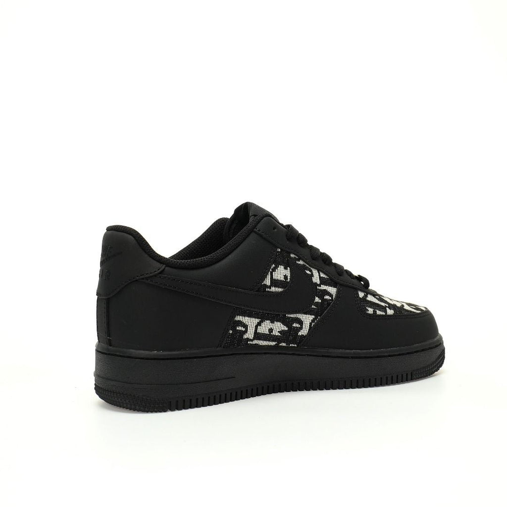 Black sneaker with white pattern on a white background