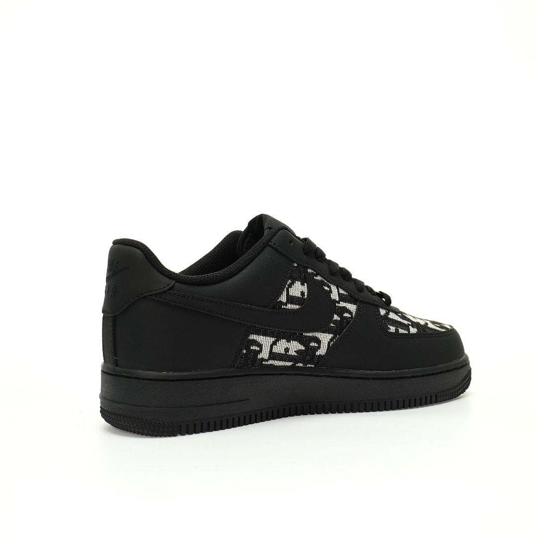 Black sneaker with white pattern on a white background