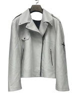 White leather jacket on a hanger against a white background