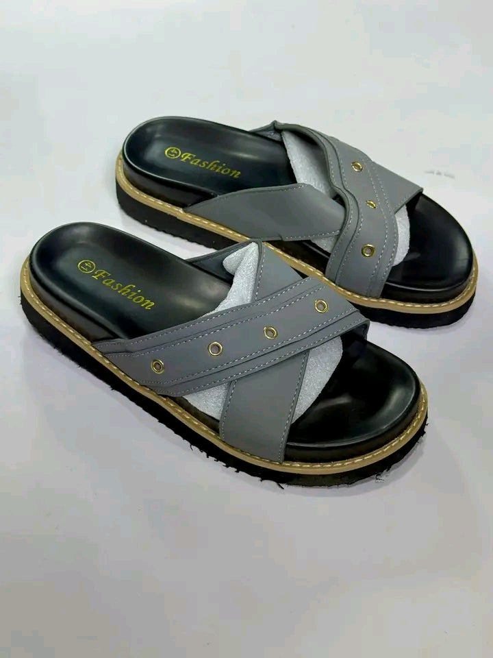 Pair of black and gray sandals with 'Fashion' branding on a white background