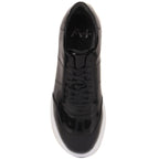 Black glossy sneaker with white sole on a white background