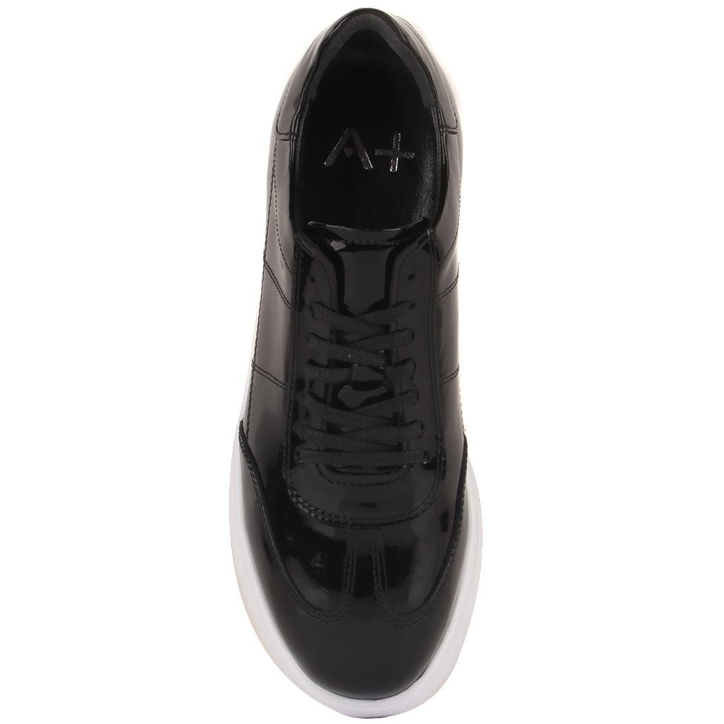 Black glossy sneaker with white sole on a white background