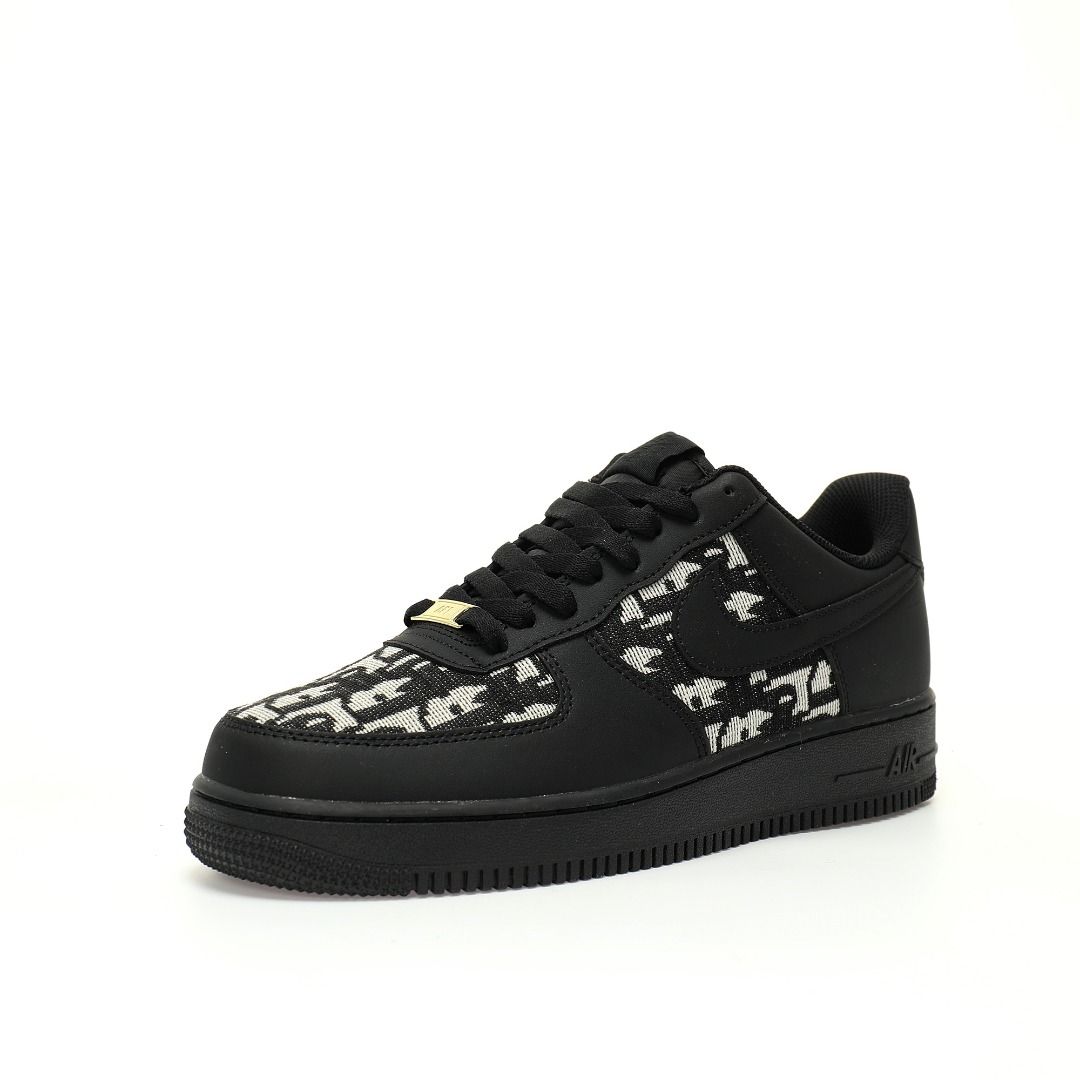 Black sneaker with white pattern on a white background