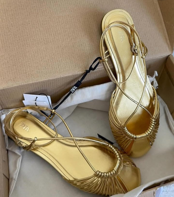 Golden flat sandals