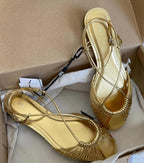 Golden flat sandals