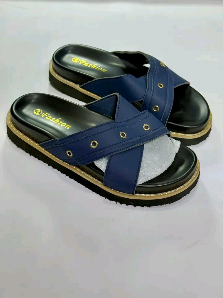 Blue sandals with black soles on a white background